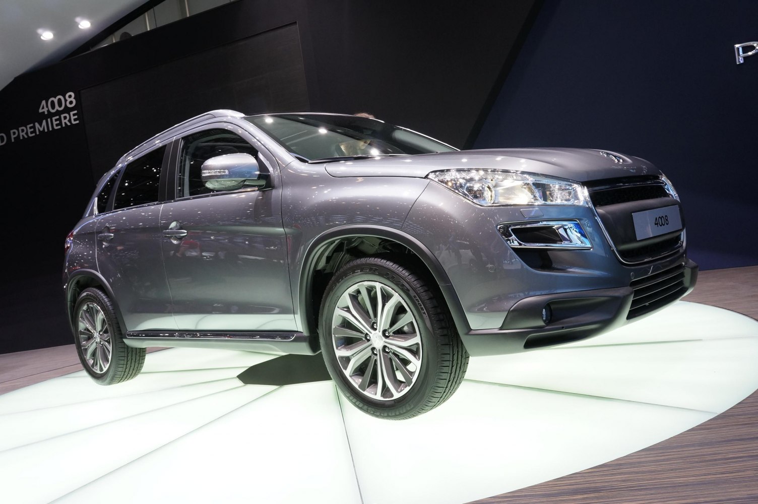 Front side view of SUV with LED headlights and alloy wheels
