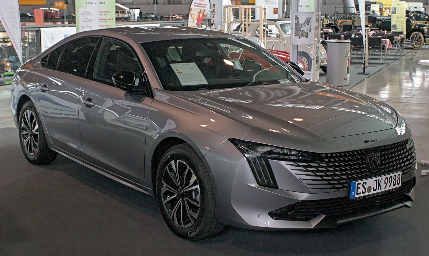 Sleek front and side exterior with distinctive grille and headlights
