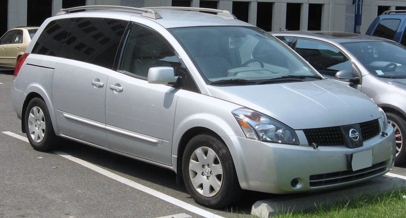 Silver minivan front side view with roof rails and alloy wheels