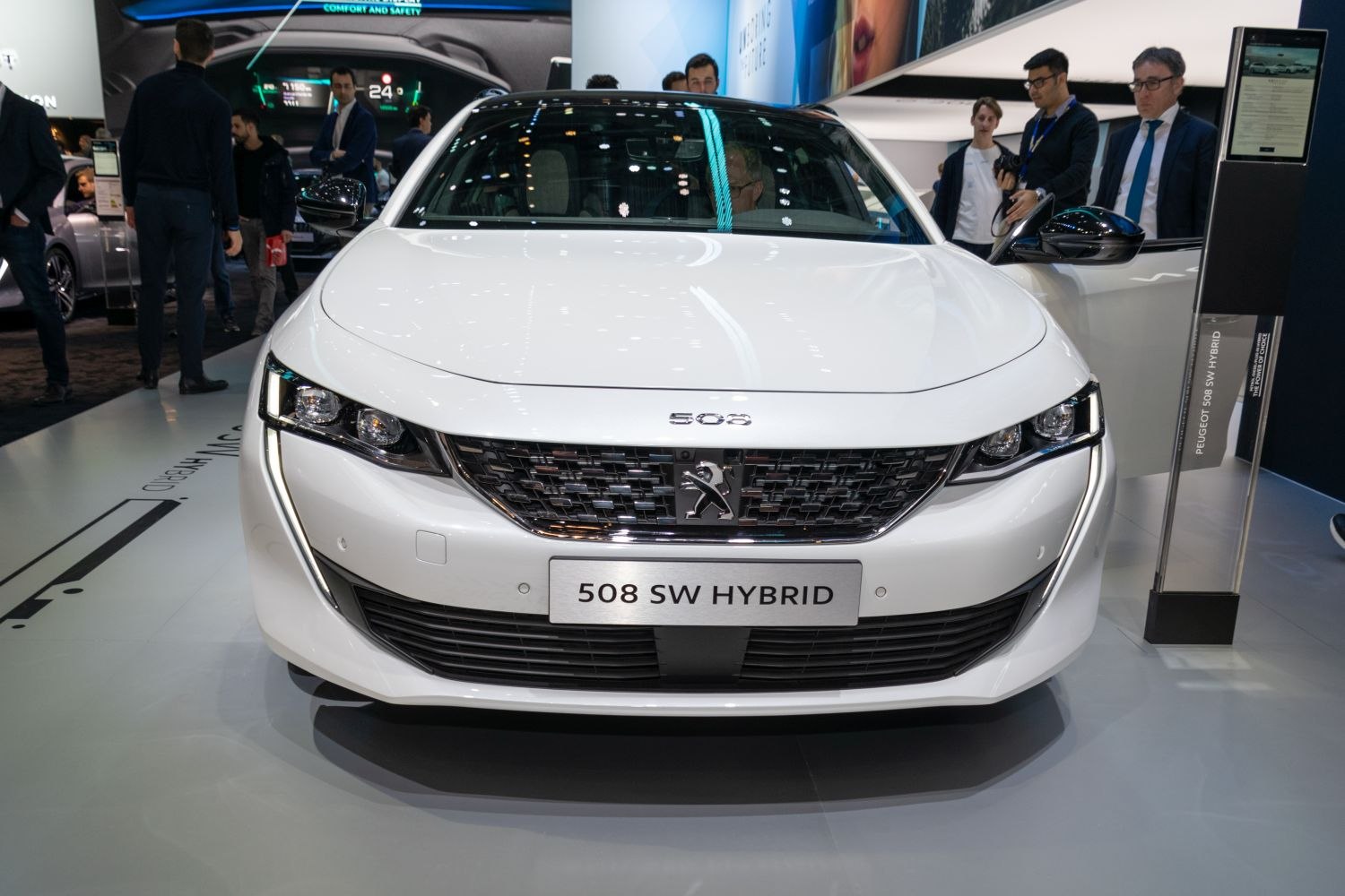 Front view with LED headlights and distinctive grille design