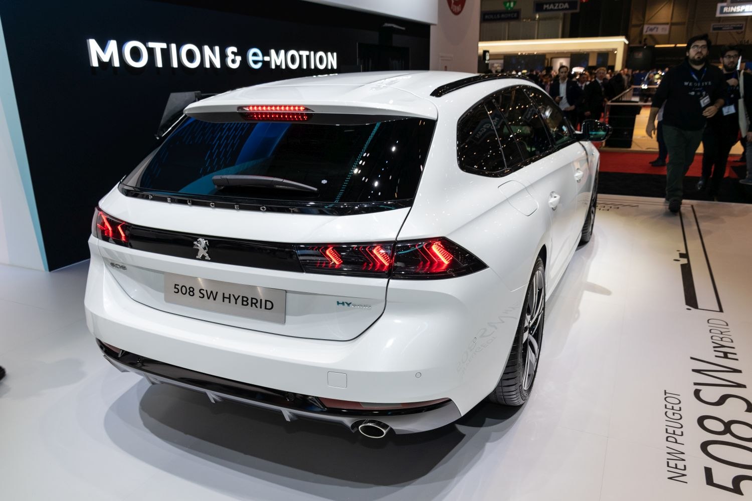 Rear view of hybrid station wagon with LED taillights and panoramic roof