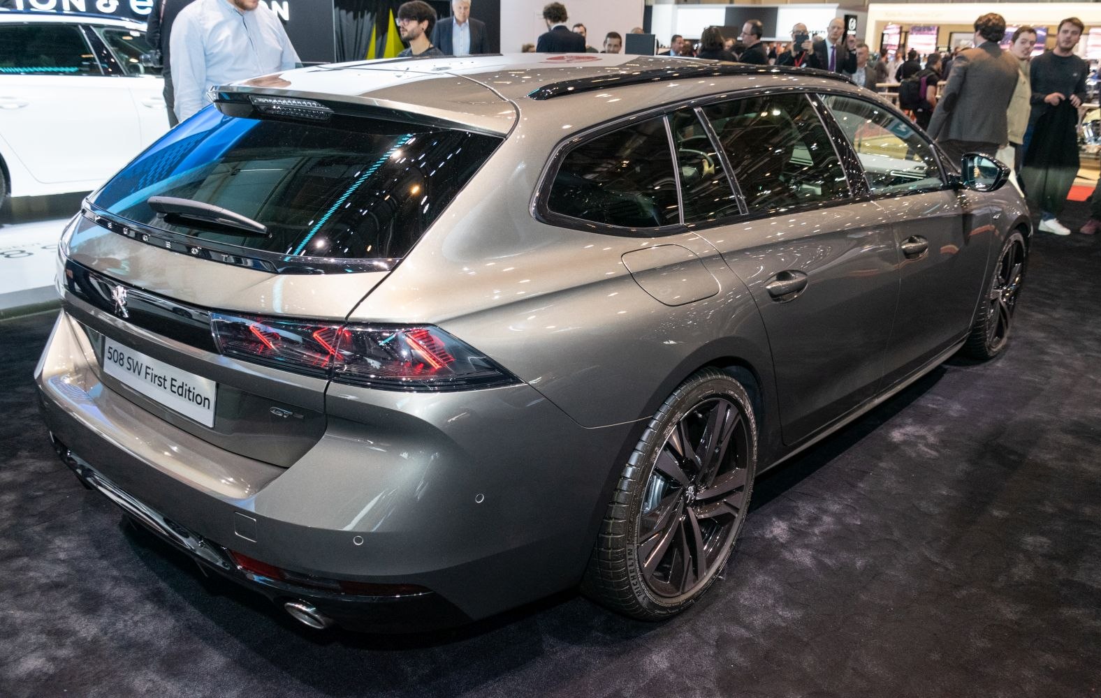 Rear and side view of wagon with distinctive taillights and alloy wheels