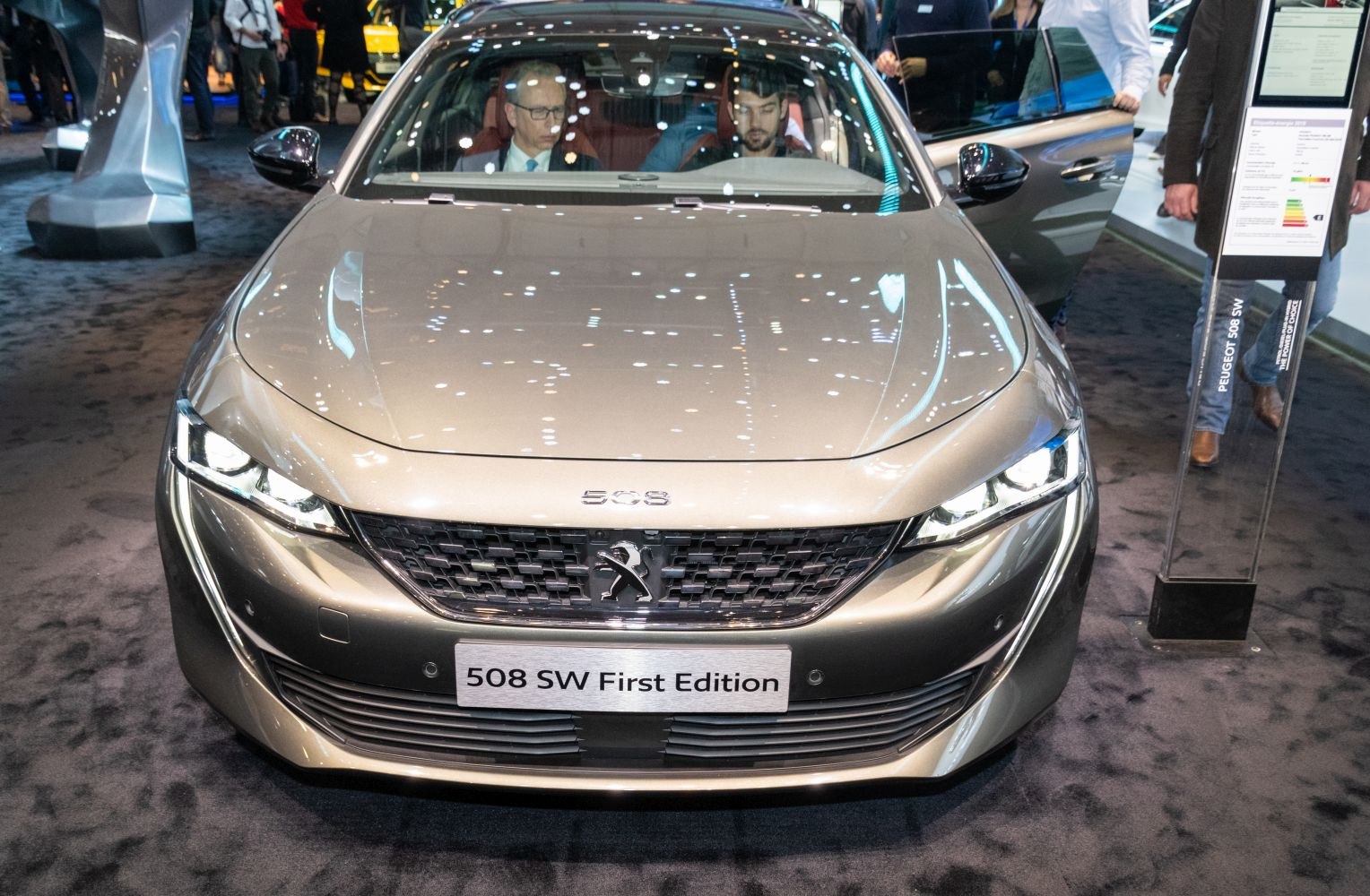 Front view of car with distinctive grille and headlights