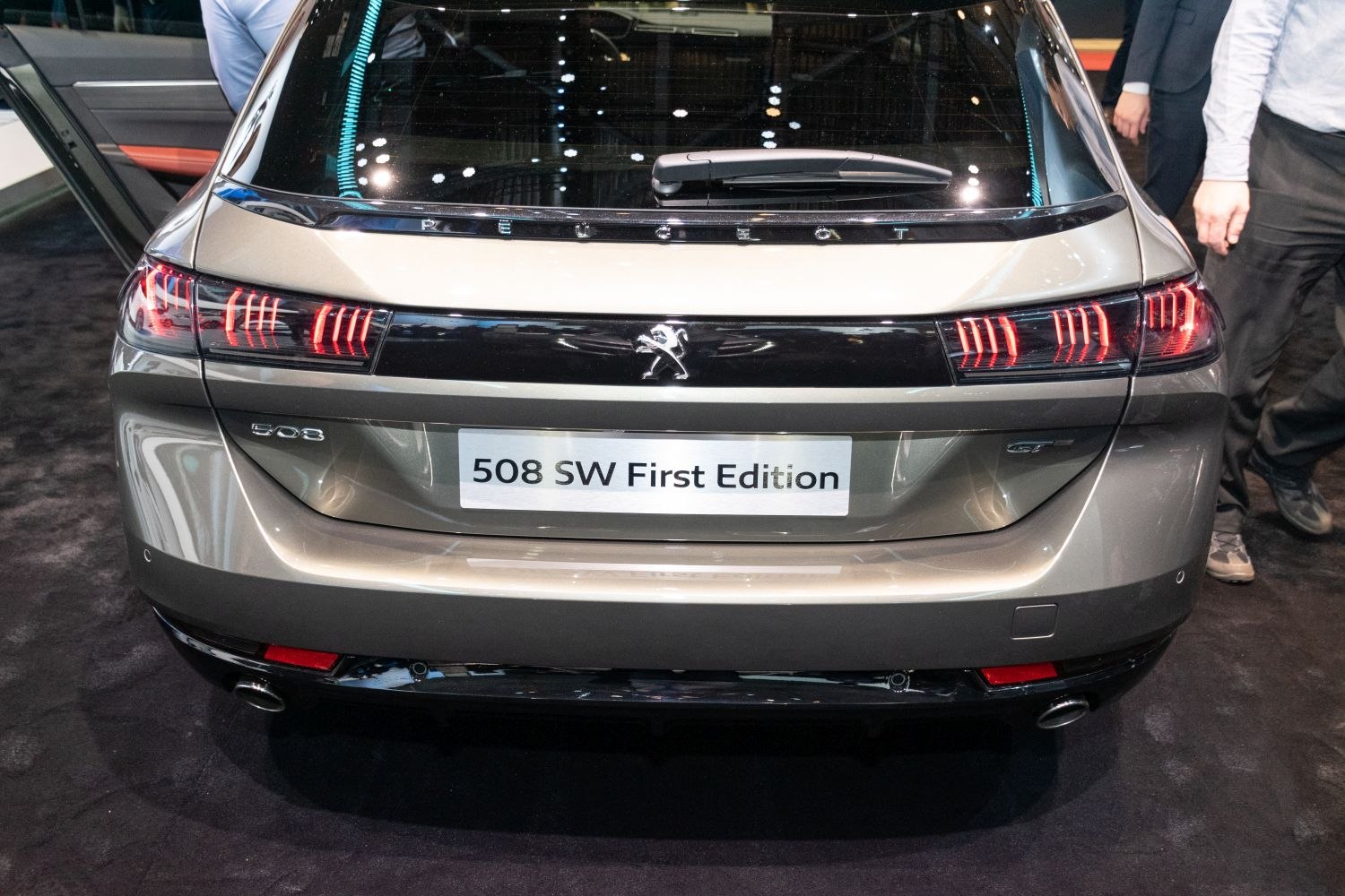 Rear view with signature LED taillights and dual exhaust pipes