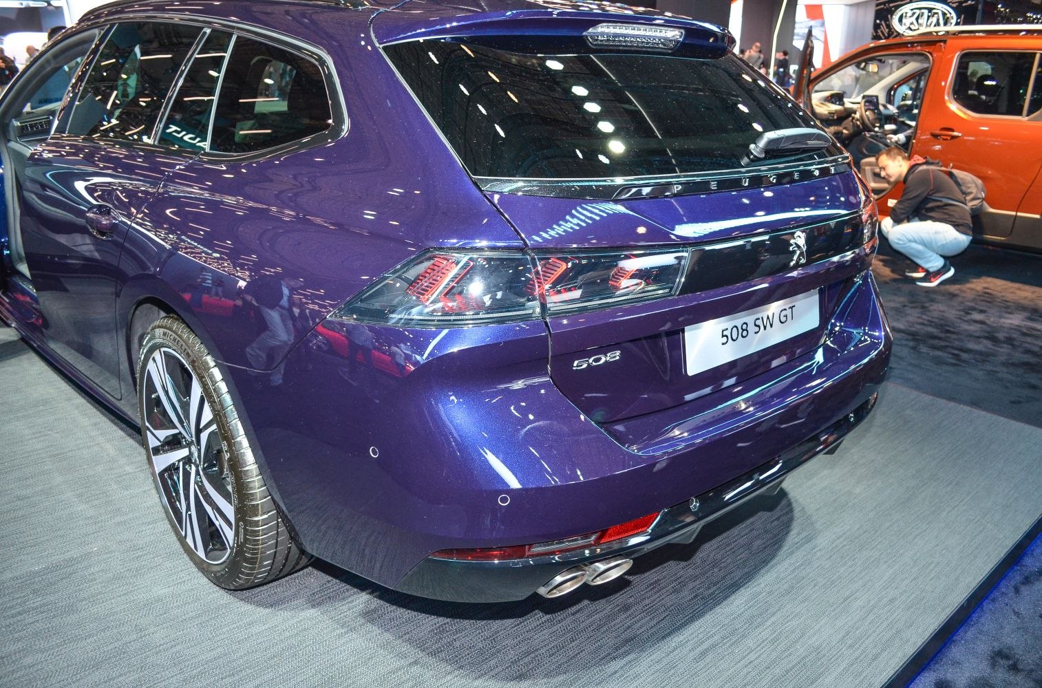 Sleek rear with distinctive taillights and dual exhaust pipes