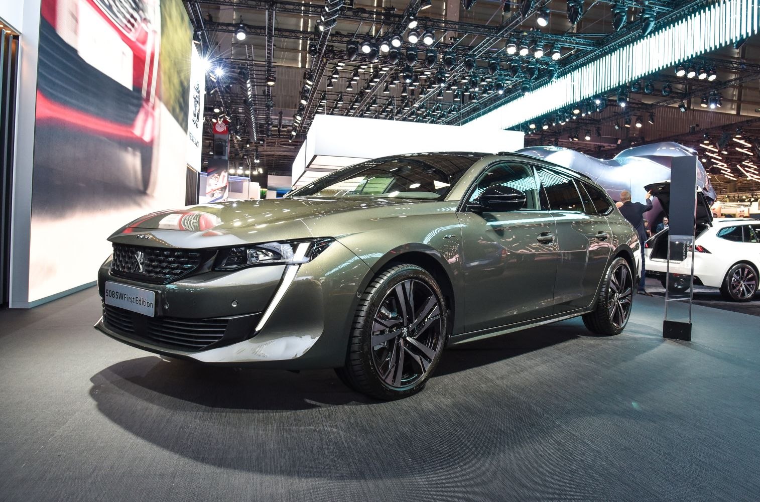 Front fascia and side profile with distinctive headlights and alloy wheels
