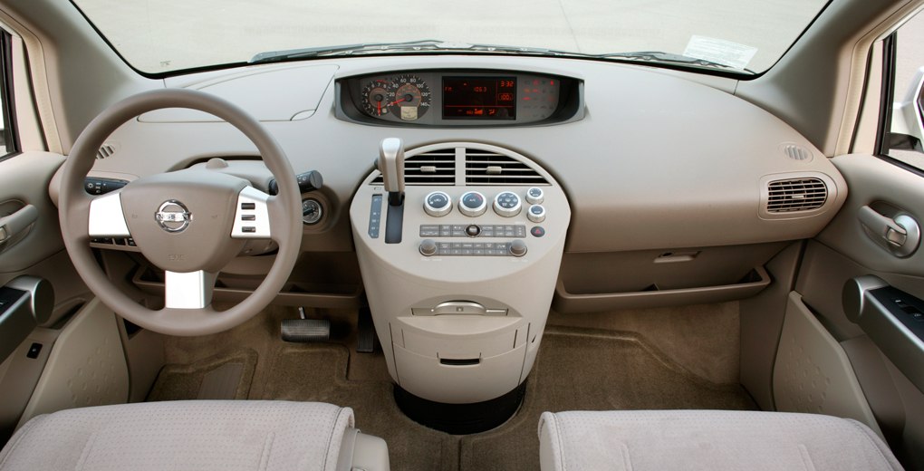 Dashboard and center console layout with digital display and automatic gear shift.