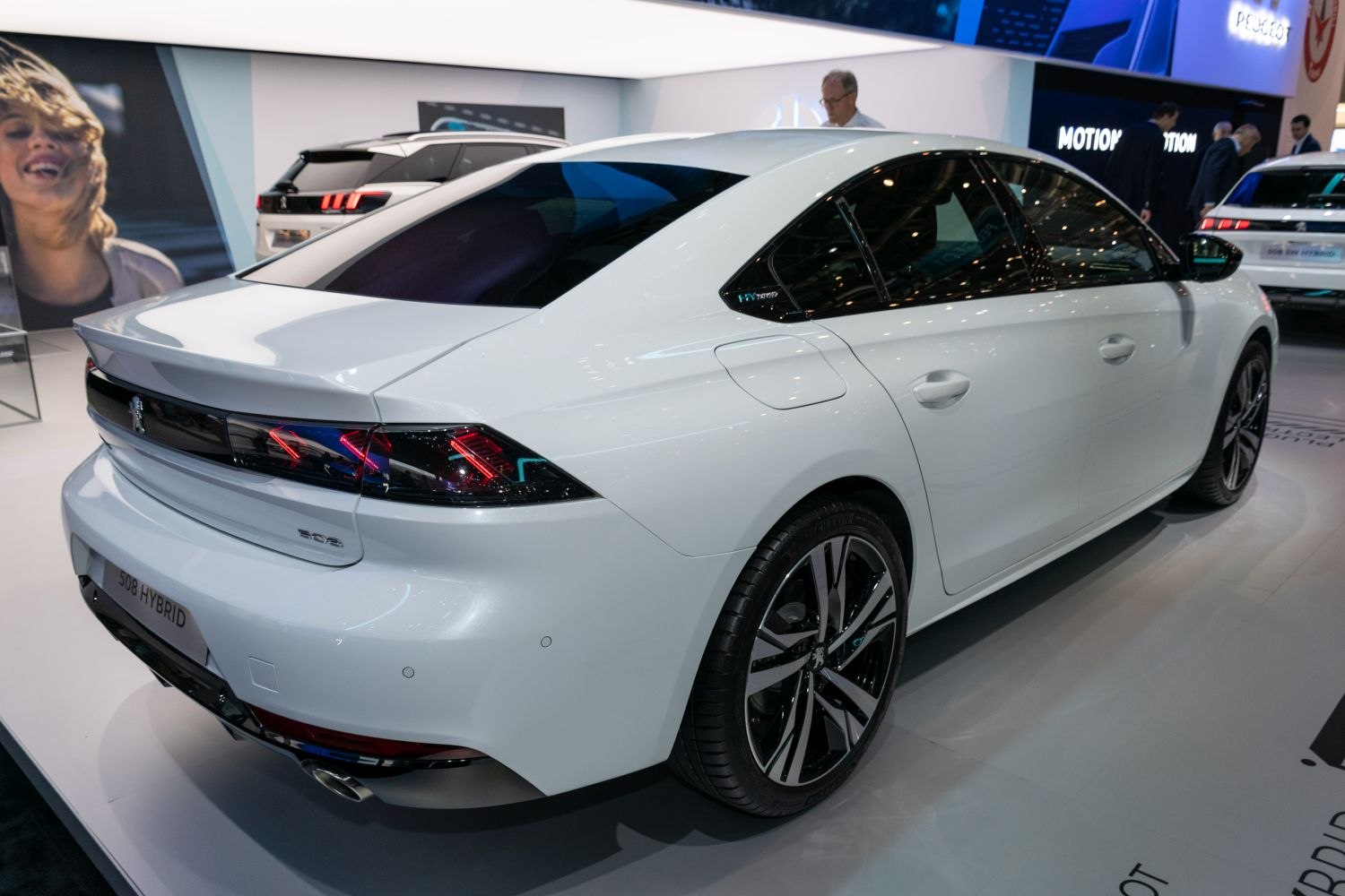 Sleek rear and side view with distinctive taillights and alloy wheels