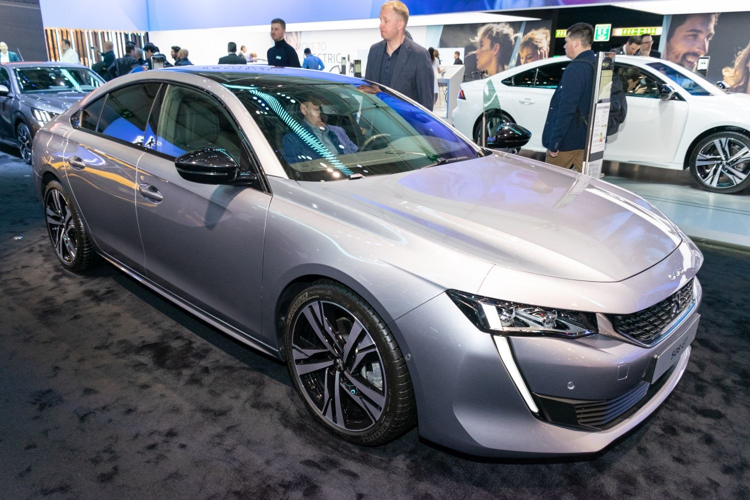 Sleek modern sedan with LED headlights and sporty alloy wheels