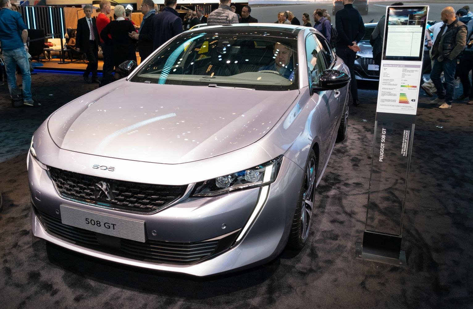 Front view featuring modern LED headlights and sleek grille design