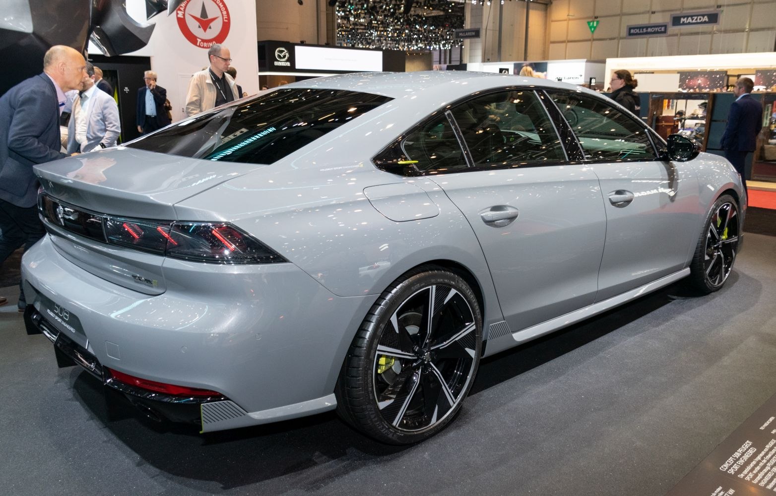 Sleek rear profile and stylish alloy wheels with tinted windows.