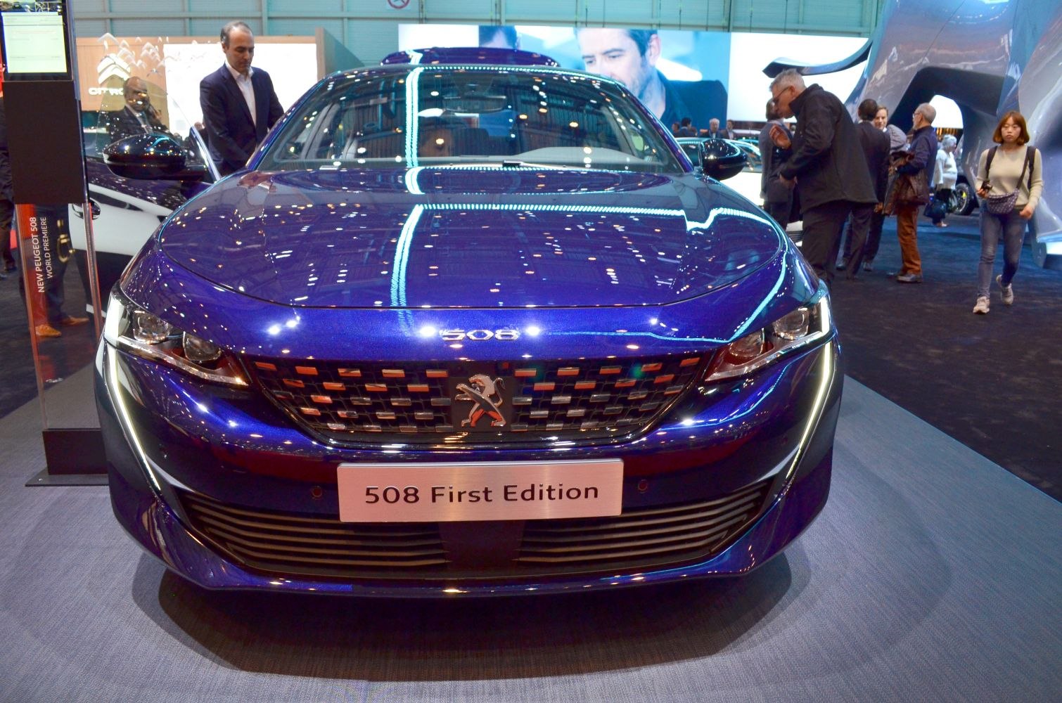 Close-up of front grille and headlights with sleek hood design