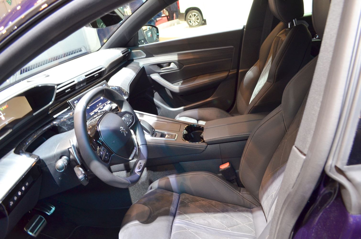 Modern interior with digital dashboard and ergonomic front seats
