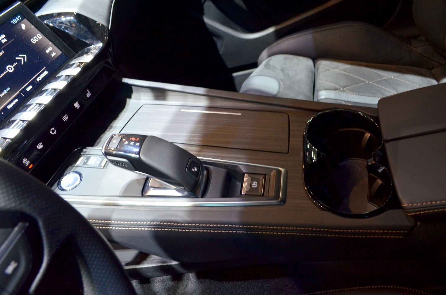 Interior automatic gear shifter and center console with cupholder