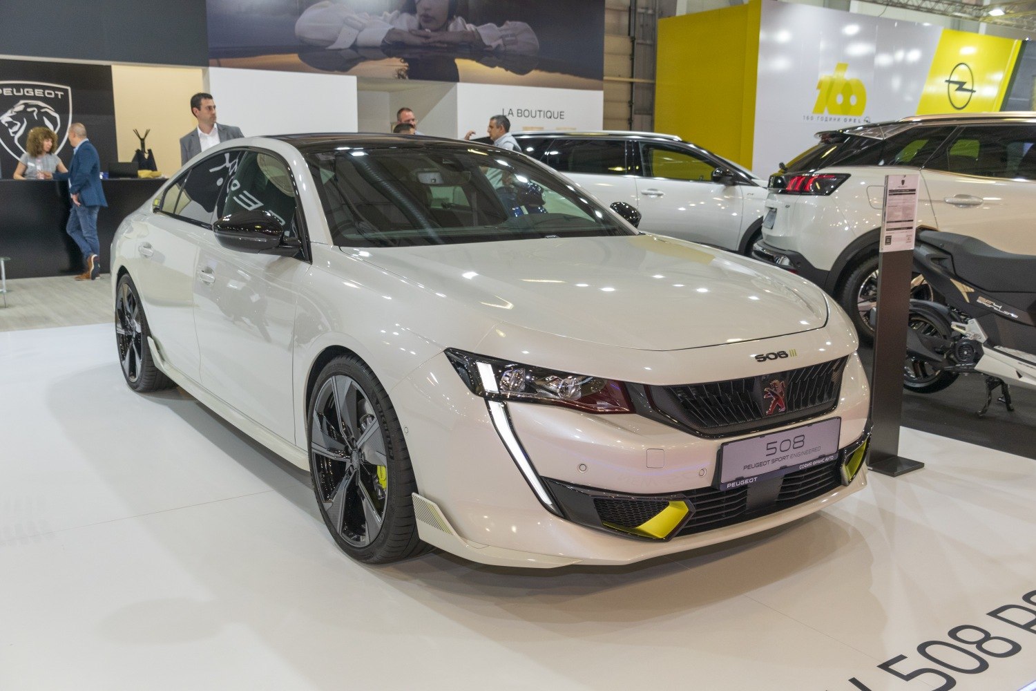 Front angled view with LED headlights and sporty front accents.