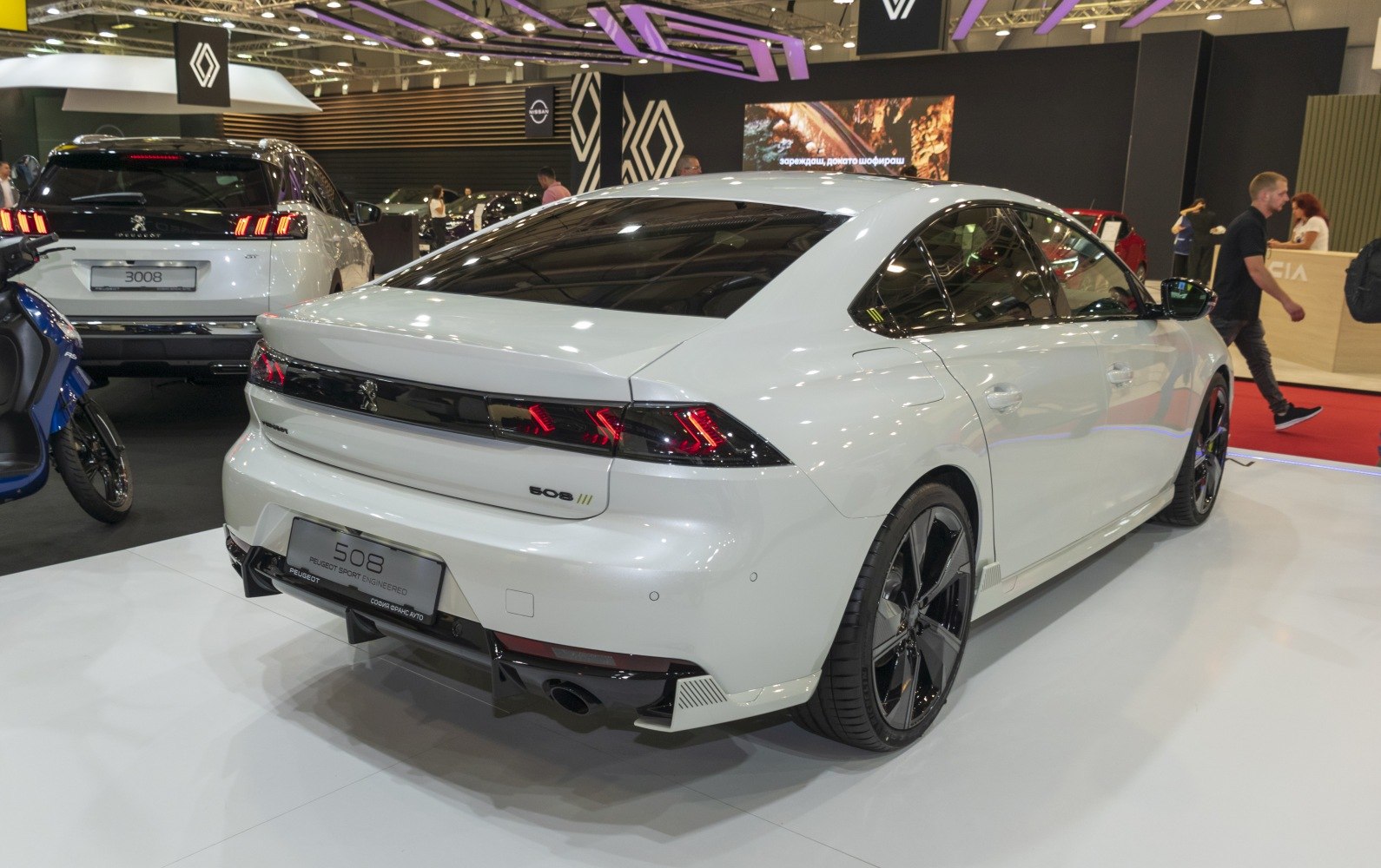 Rear view of sedan with sleek taillights and aerodynamic rear design