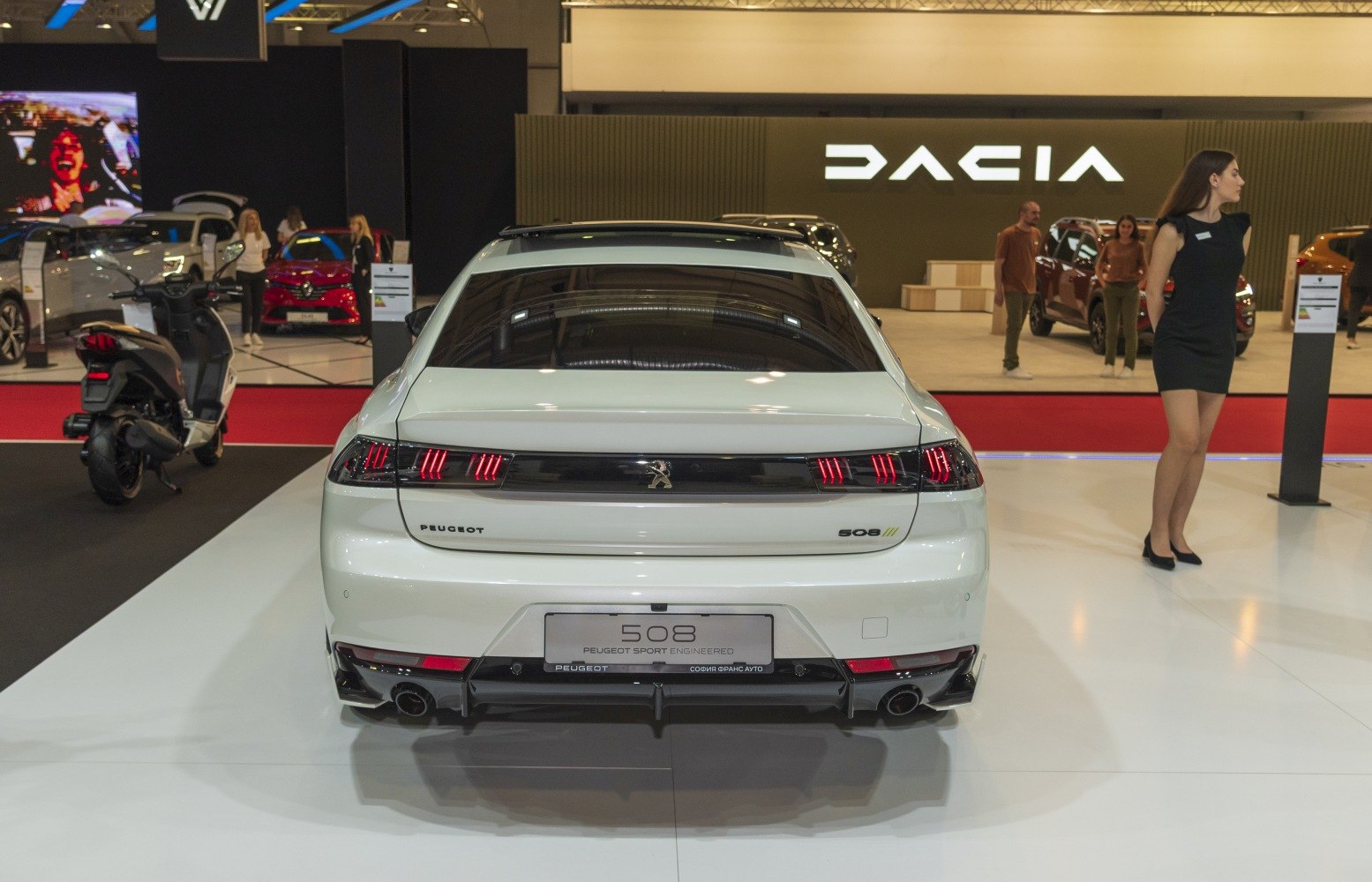 Rear view with distinctive LED tail lights and dual exhaust tips