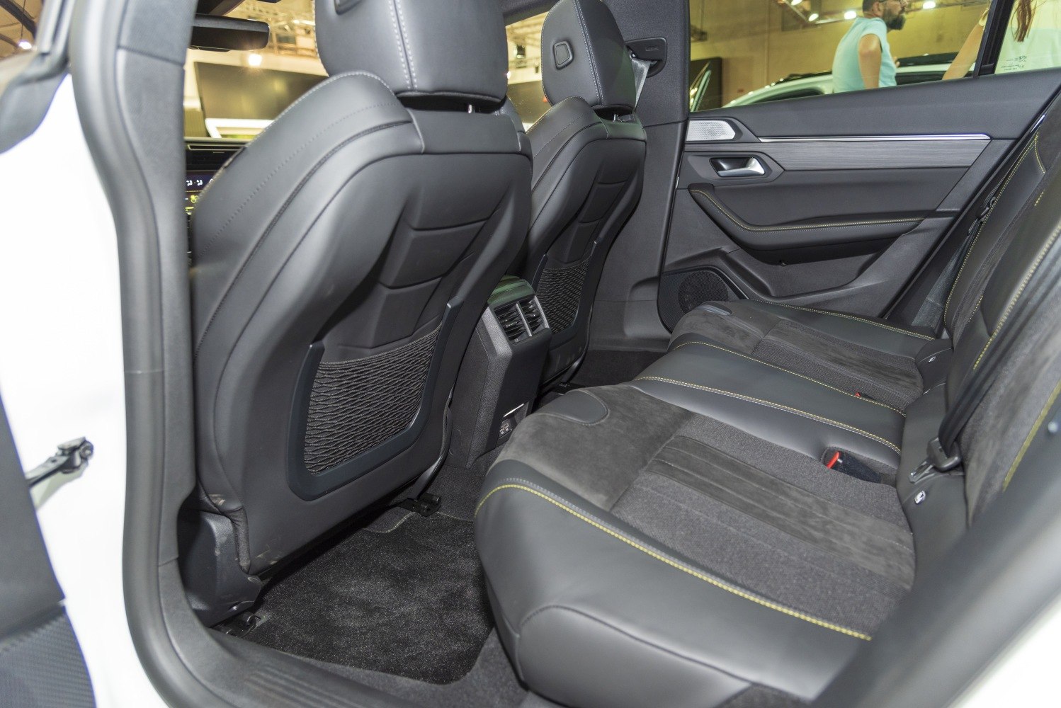 Rear seats with leather and fabric upholstery, rear air vents, spacious legroom