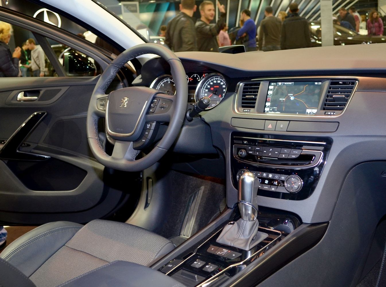 Dashboard, steering wheel, and infotainment system in modern car interior