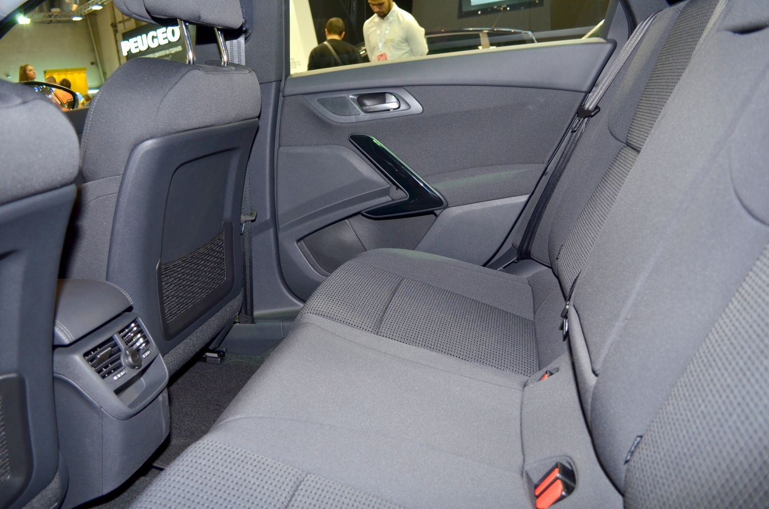 Spacious rear seat area with fabric upholstery and rear air vents
