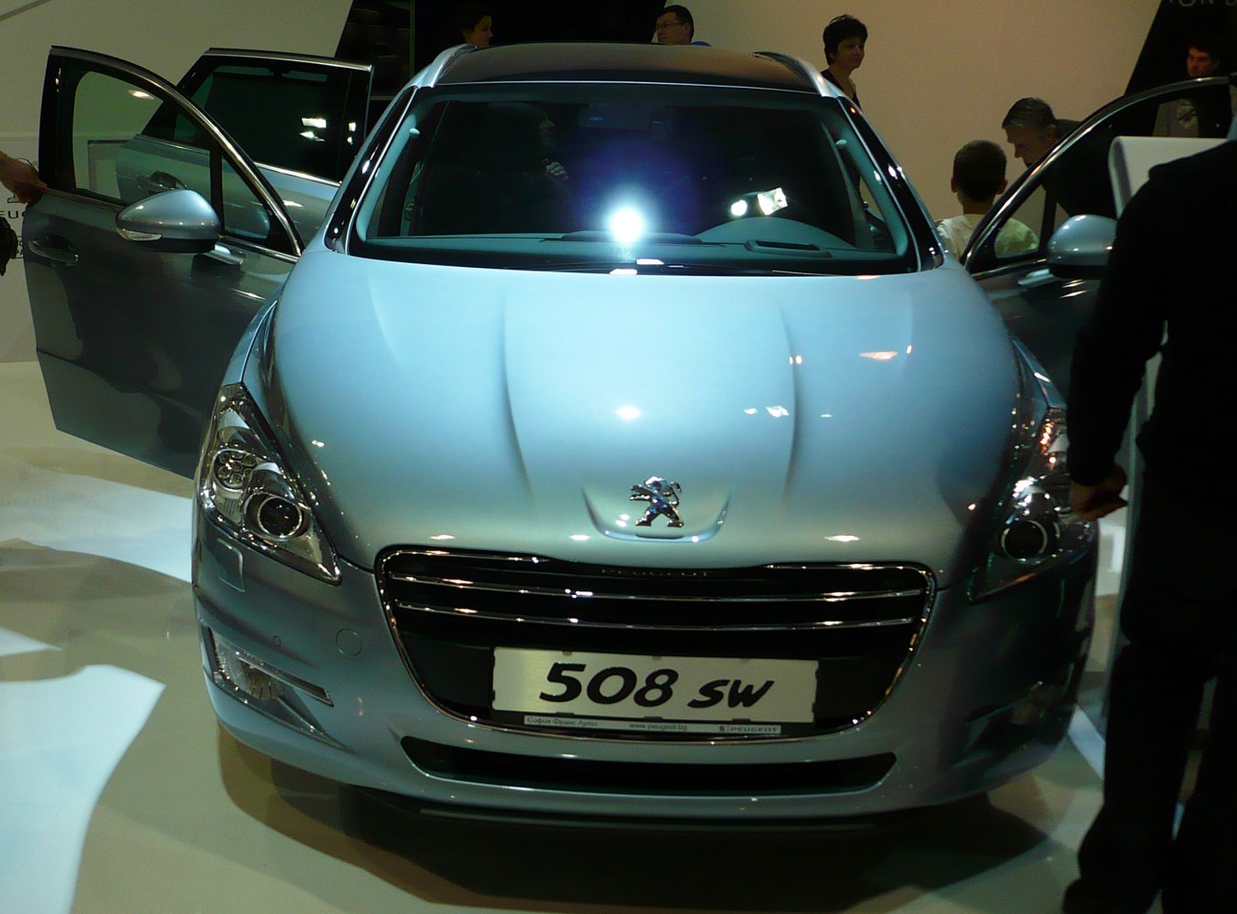 Front close-up of station wagon with grille and headlights.