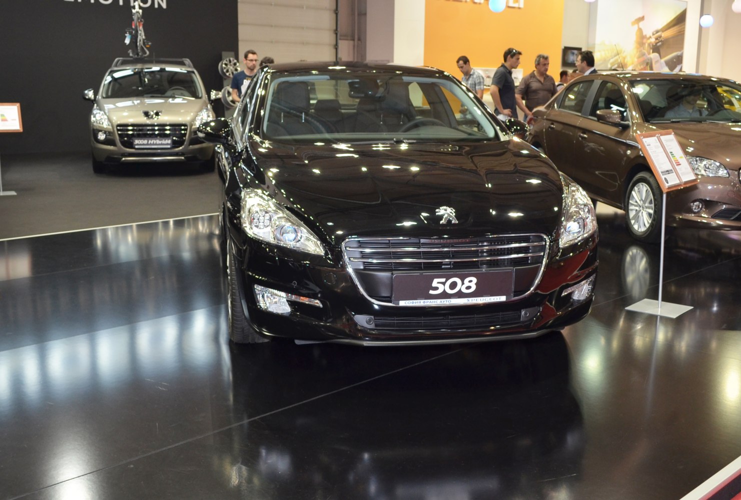 Front view of a sleek vehicle with distinctive grille and headlights
