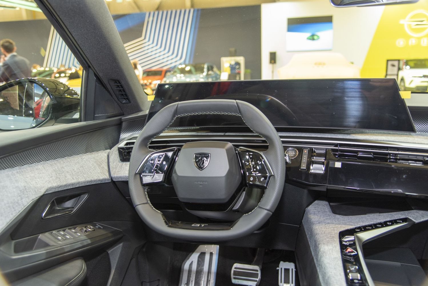 Steering wheel with integrated controls and a digital dashboard