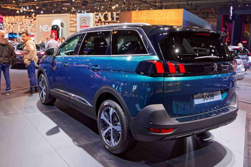 Rear view with distinctive tail lights and body contours