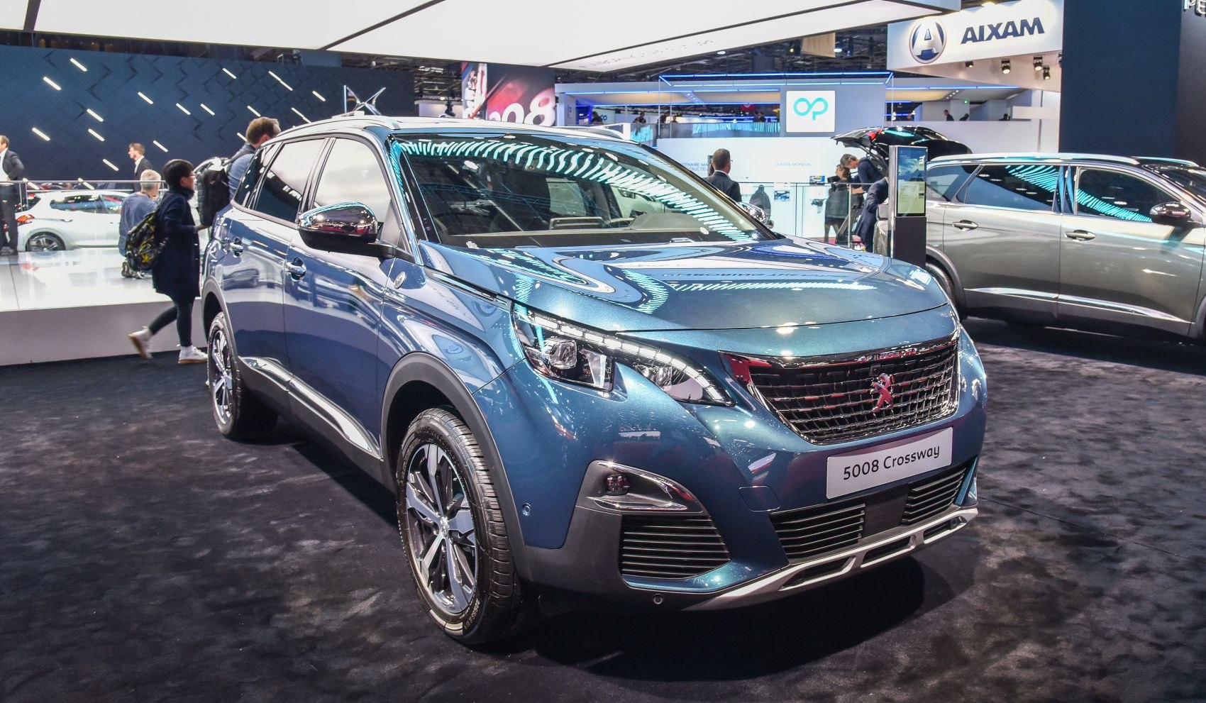 Blue SUV with distinctive front grille and LED headlights