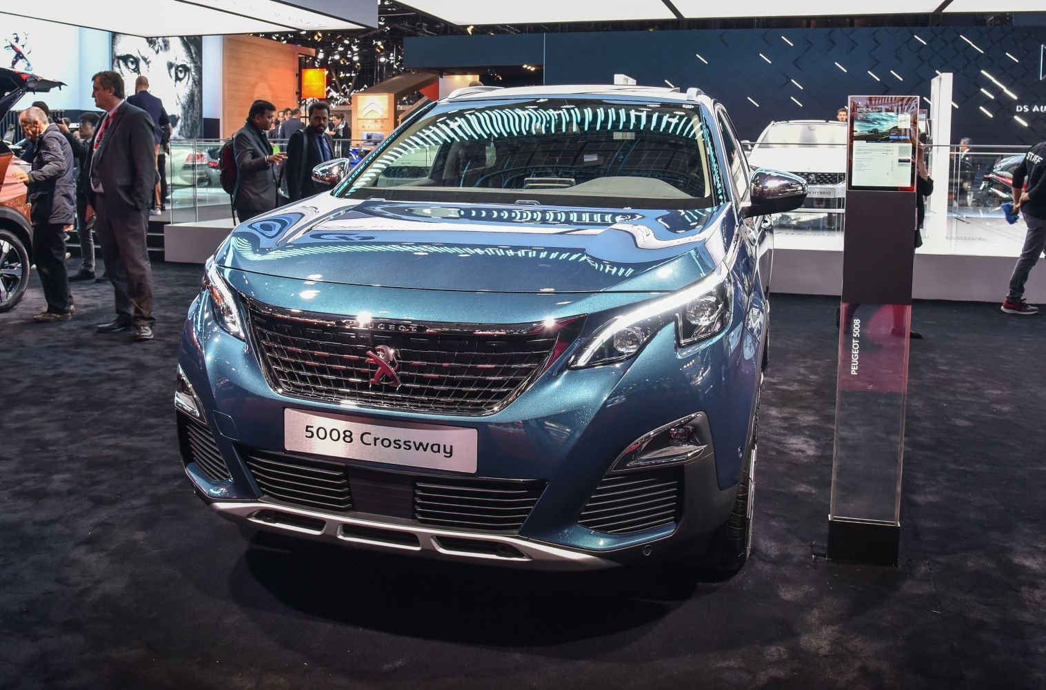Front grille and headlights of a modern SUV in showroom