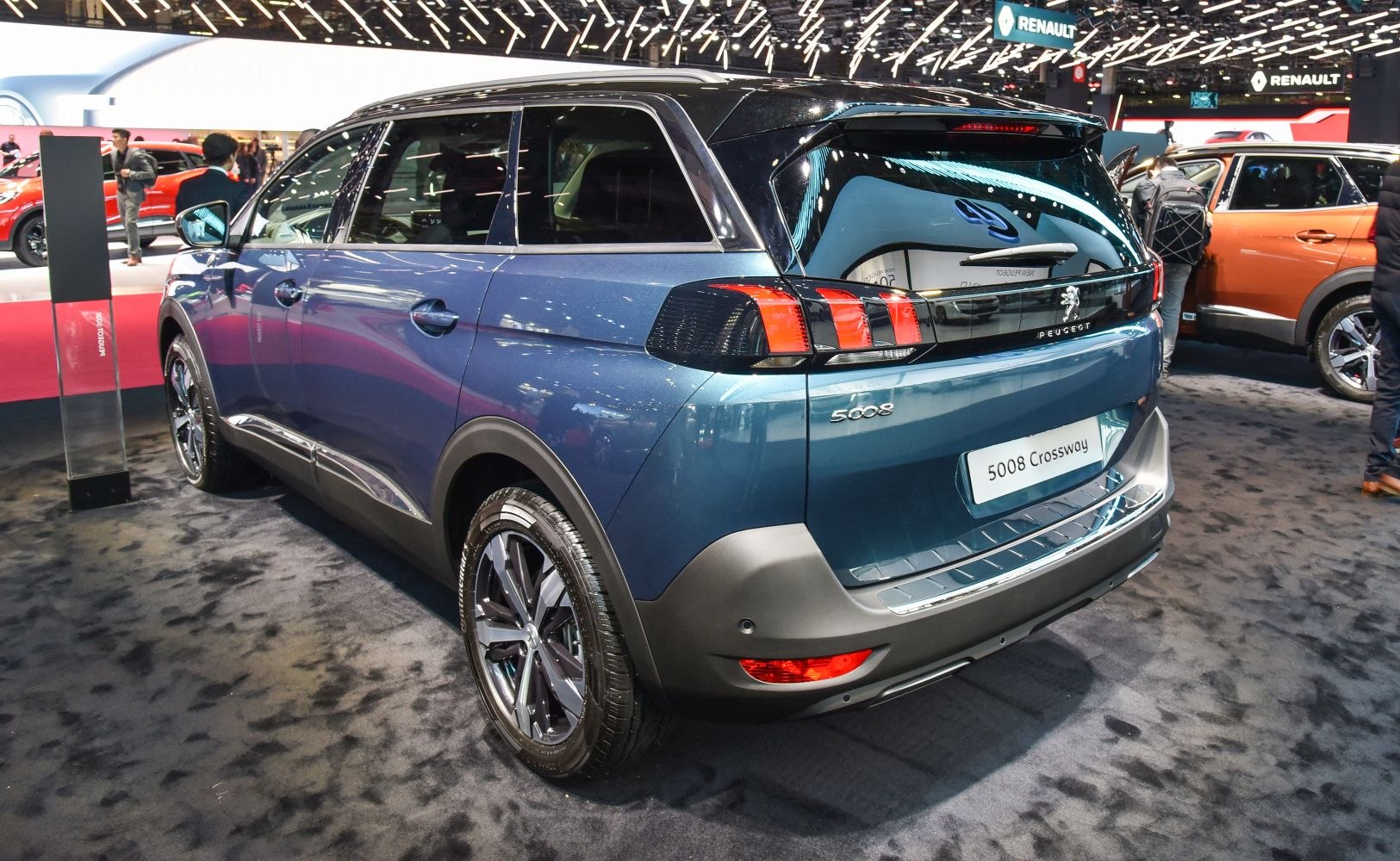 Rear and side view with distinctive tail lights and body design