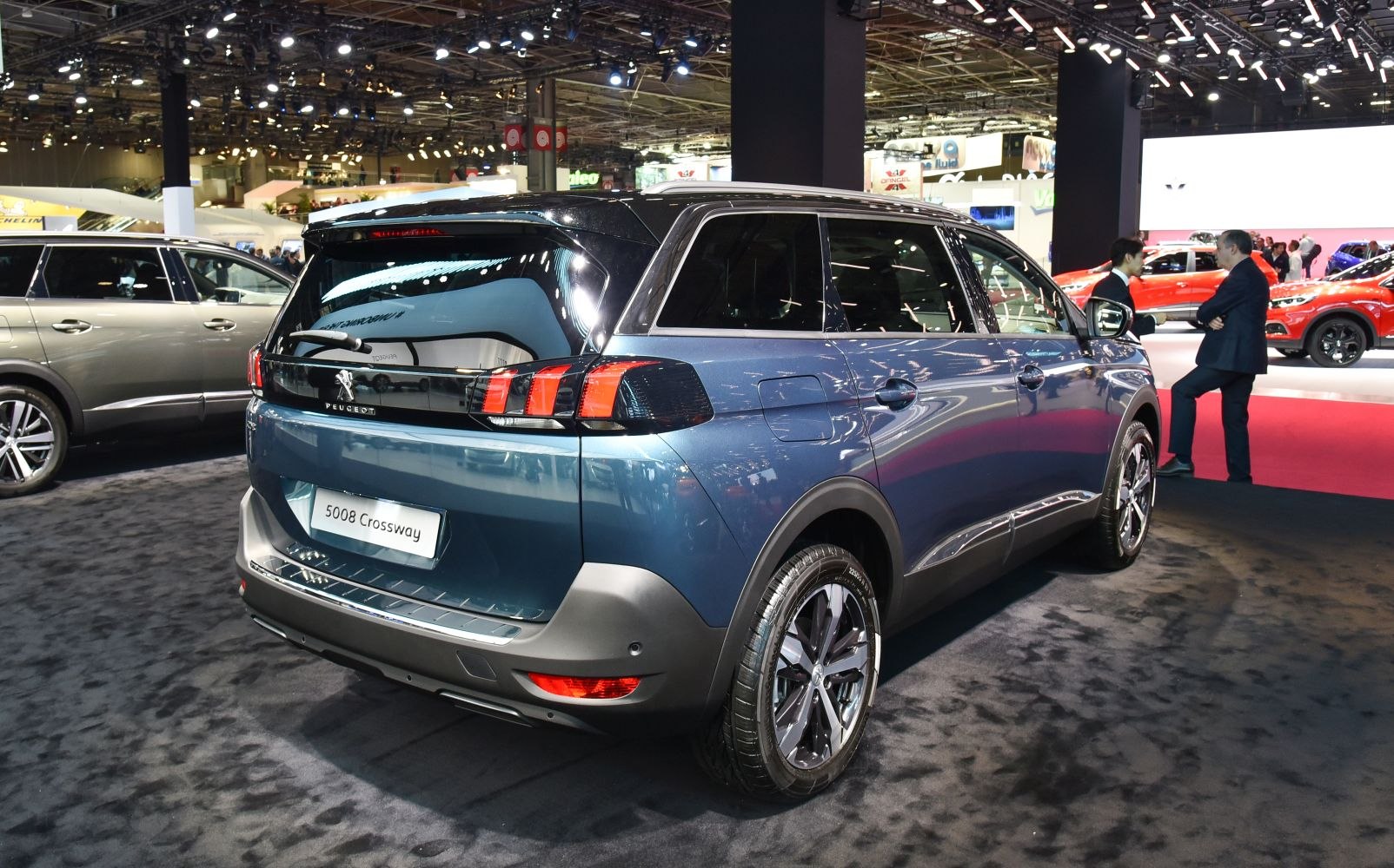 Rear and side view with distinctive tail lights and modern SUV styling