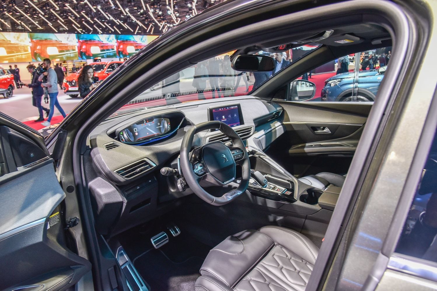 Interior dashboard, steering wheel, leather driver seat, digital instrument cluster