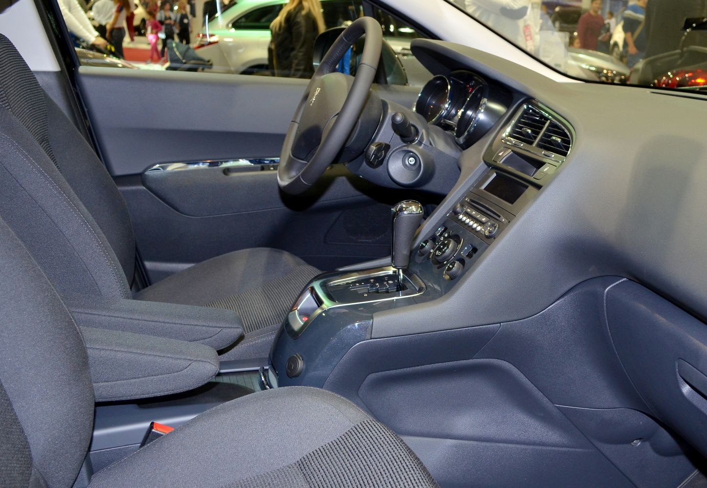 Car interior dashboard, steering wheel, automatic gear shift, front seats
