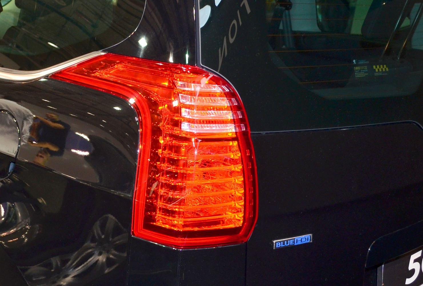 Close-up of rear LED tail light and BlueHDi badge