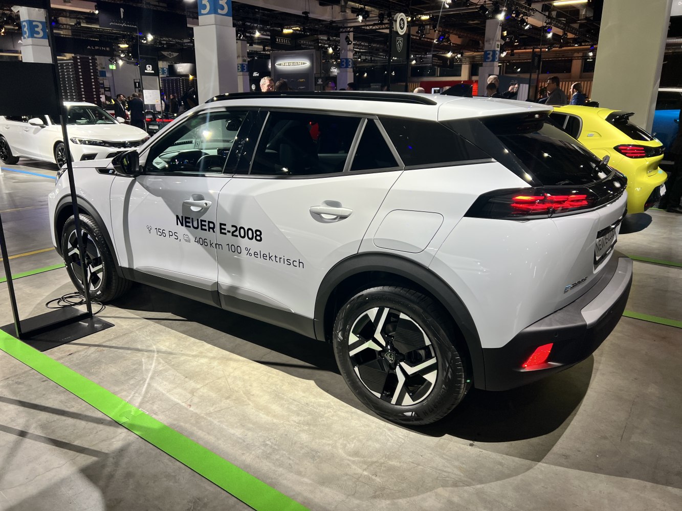 Electric SUV rear side view with LED tail lights and alloy wheels