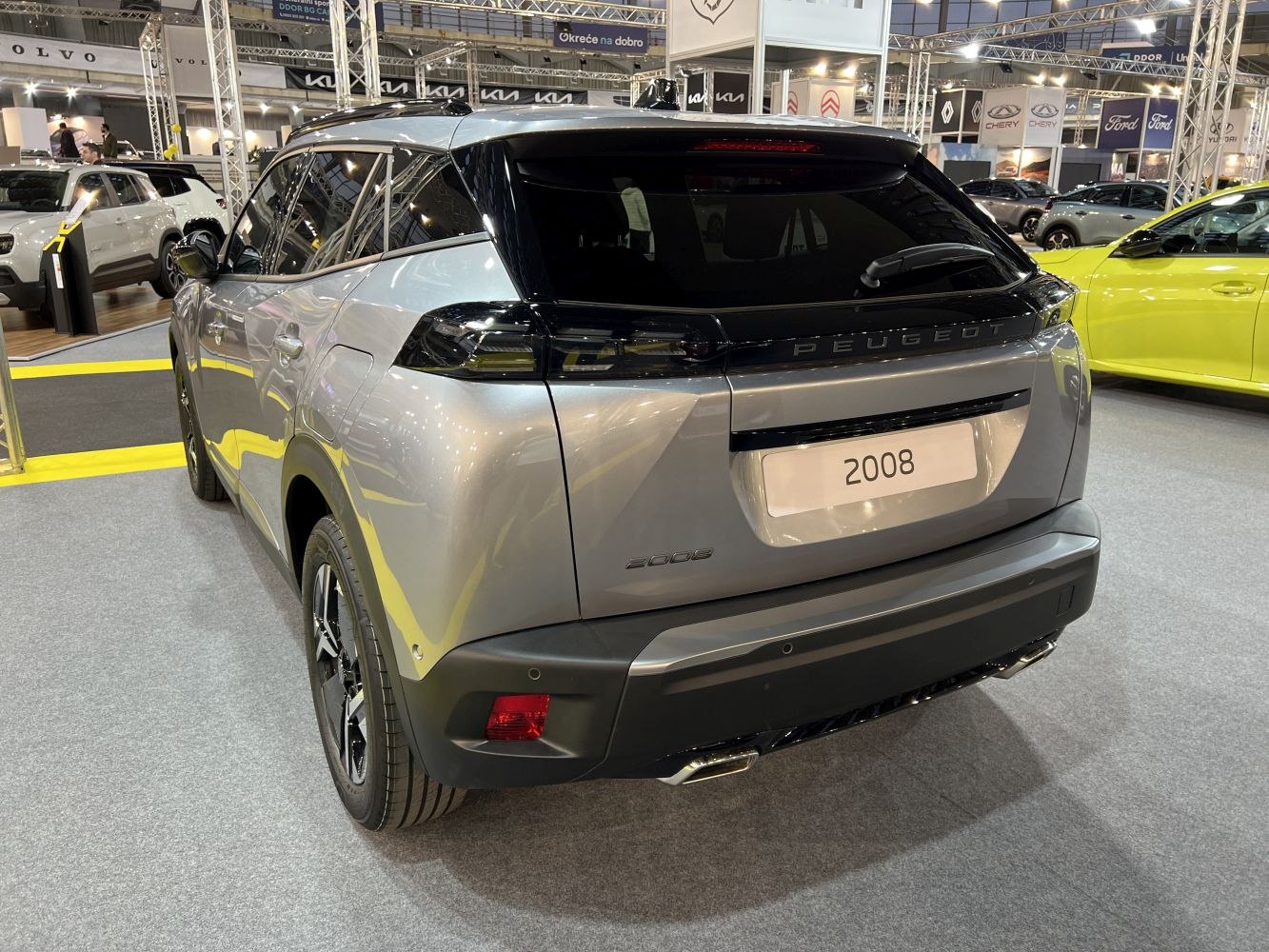 Rear view and tail light design with black trim and sporty exhaust finish