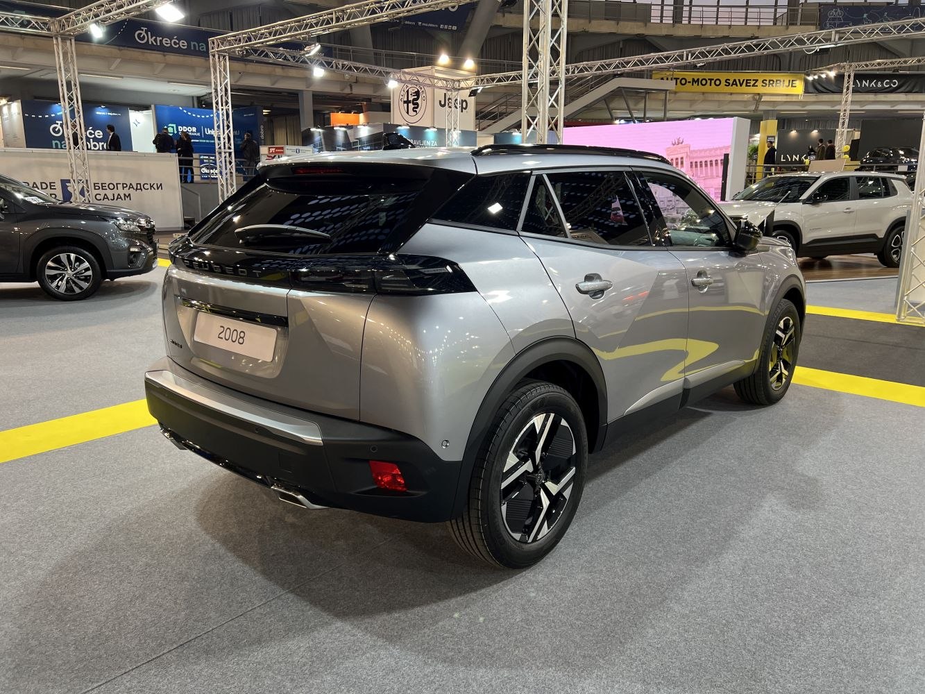 Rear and side view of modern SUV with sleek taillights and black roof contrast