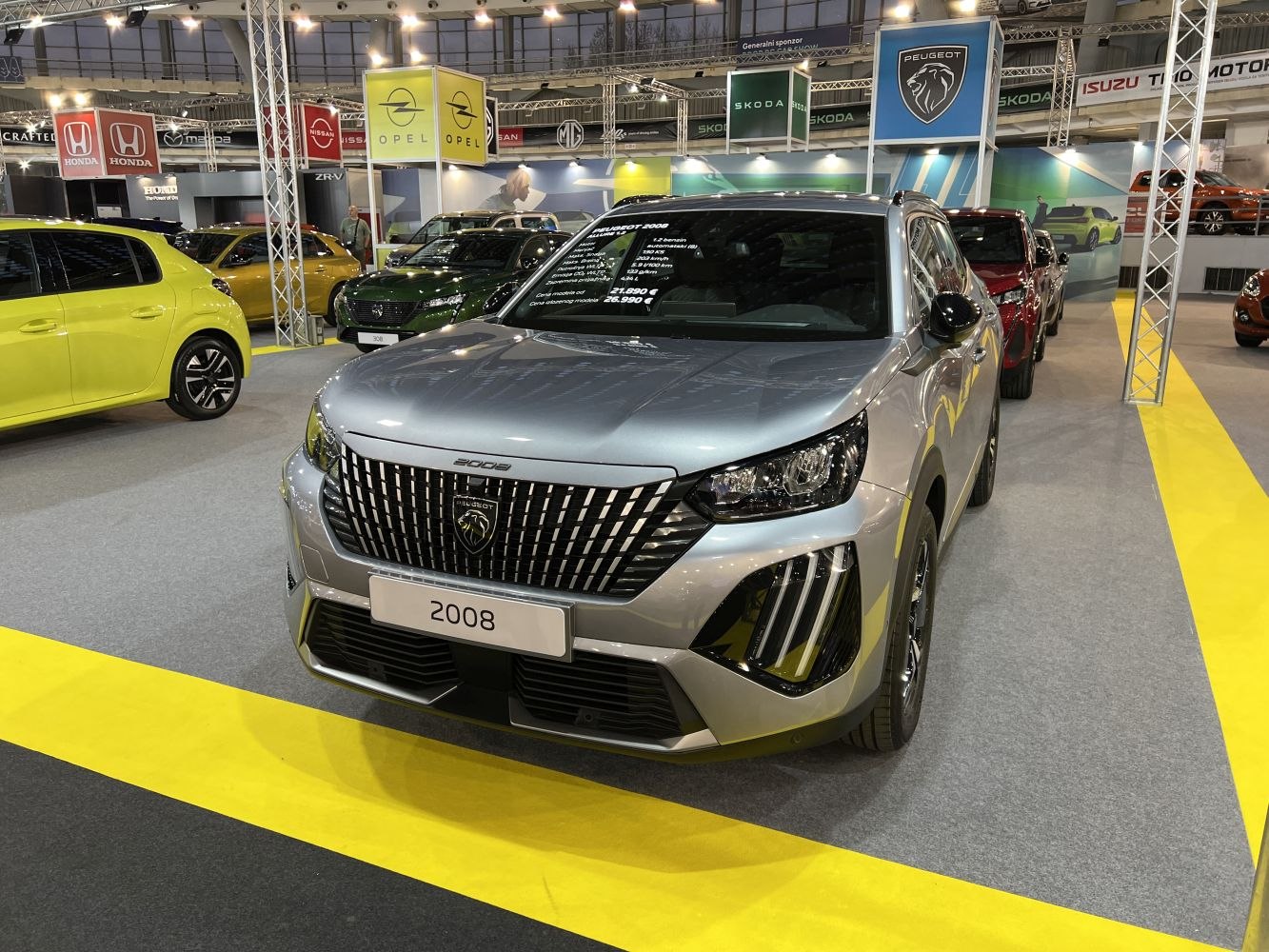 Modern front grille with integrated LED headlights on a compact SUV.