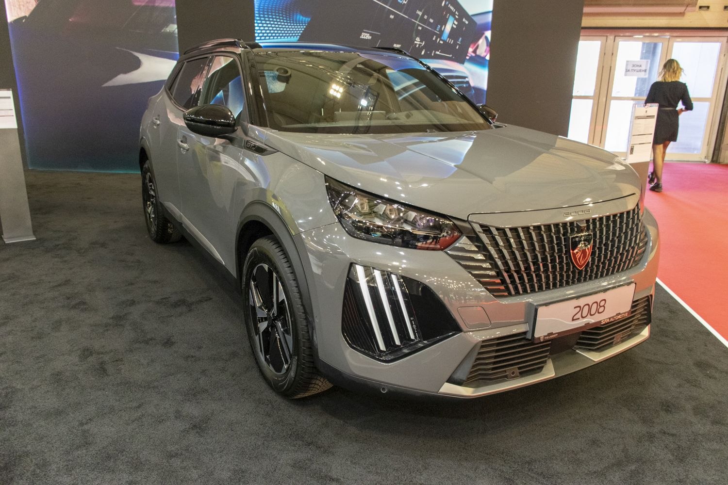 Modern compact SUV with bold grille and vertical LED daytime running lights