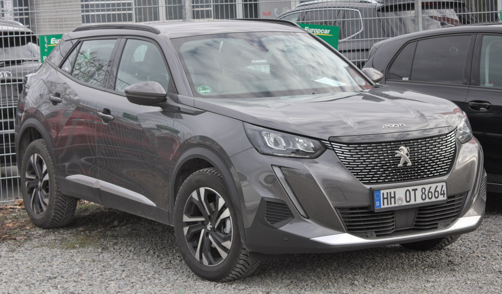Front view of SUV with distinctive grille and LED headlights