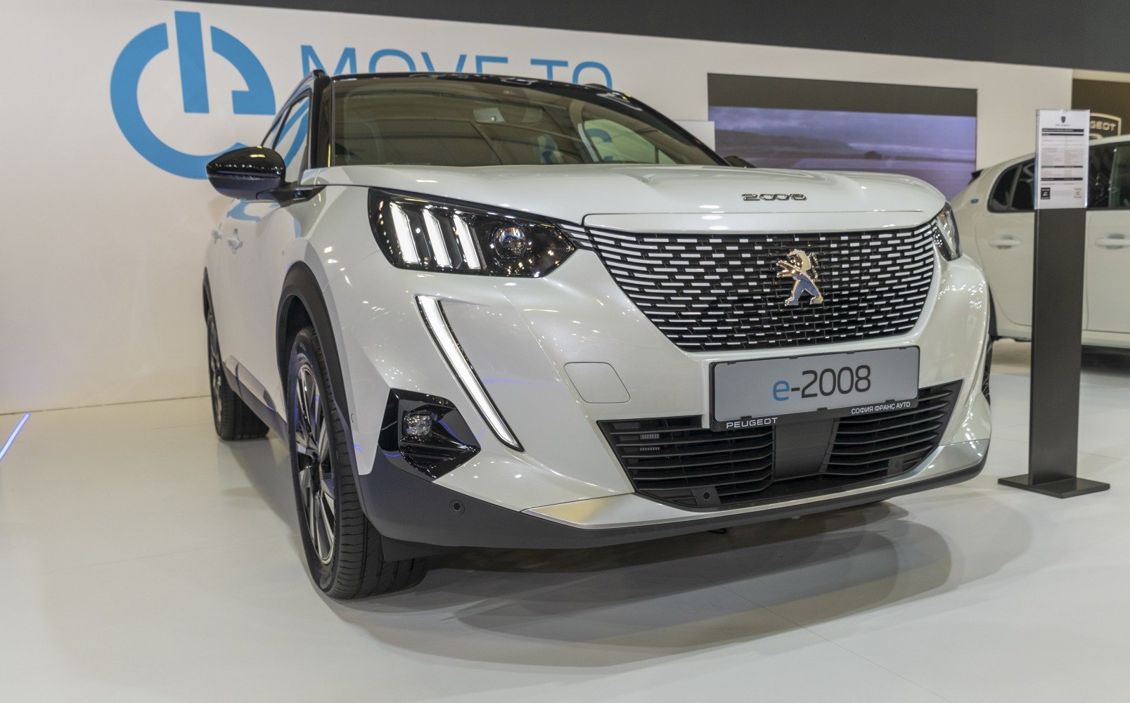 Front view with LED headlights and stylish grille