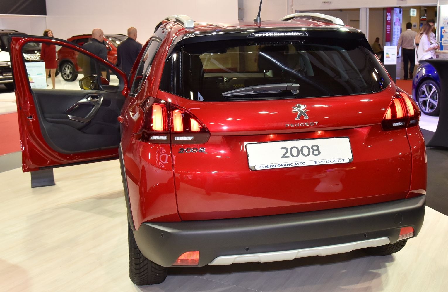 Rear hatchback with signature taillights and open door