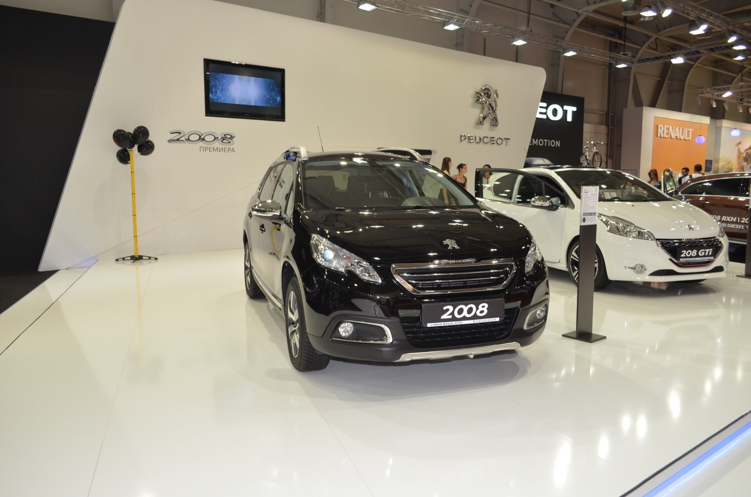 Black compact SUV front view with grille and headlights
