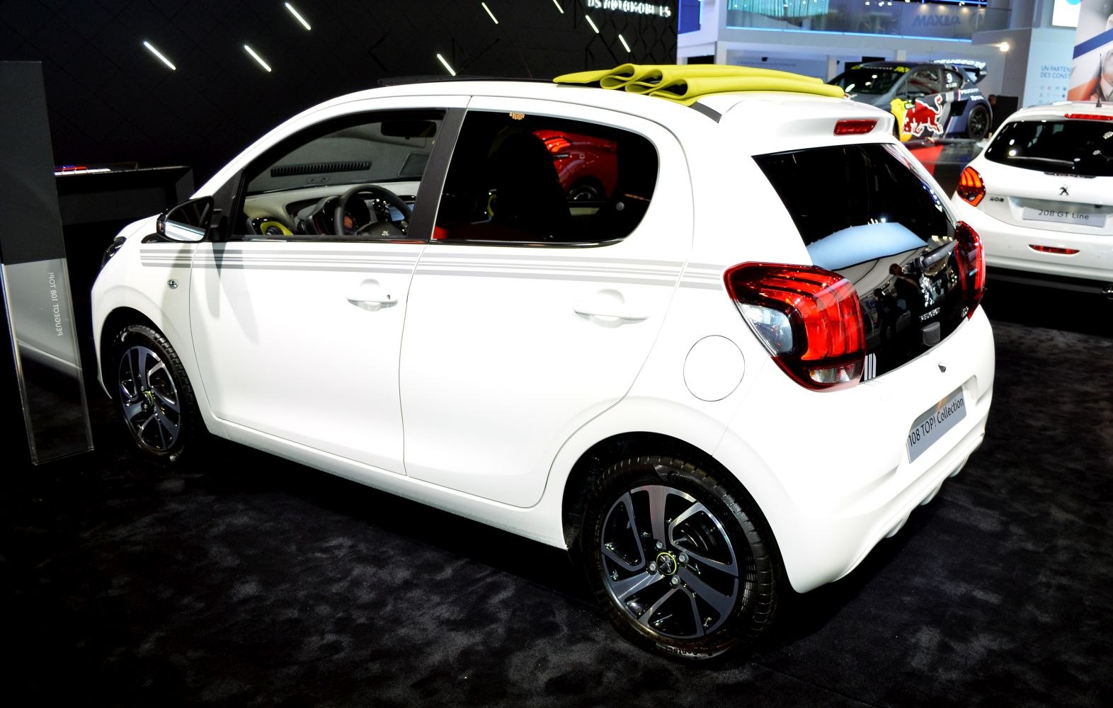 Compact hatchback with folding soft top roof and sporty alloy wheels