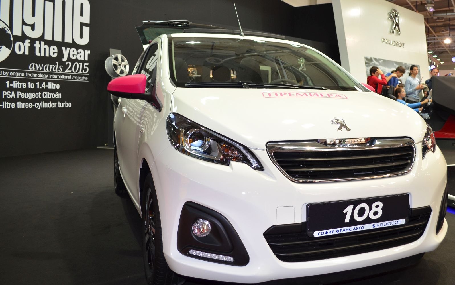 Front view with headlights and pink side mirrors