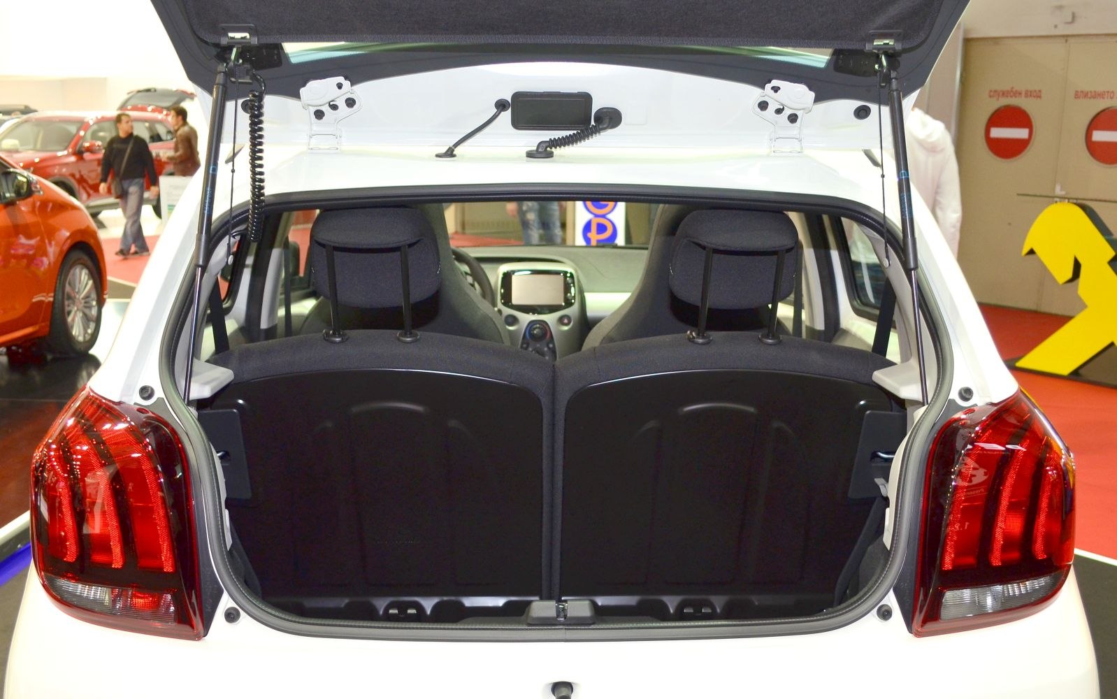 Open rear hatch with visible trunk space and front seats