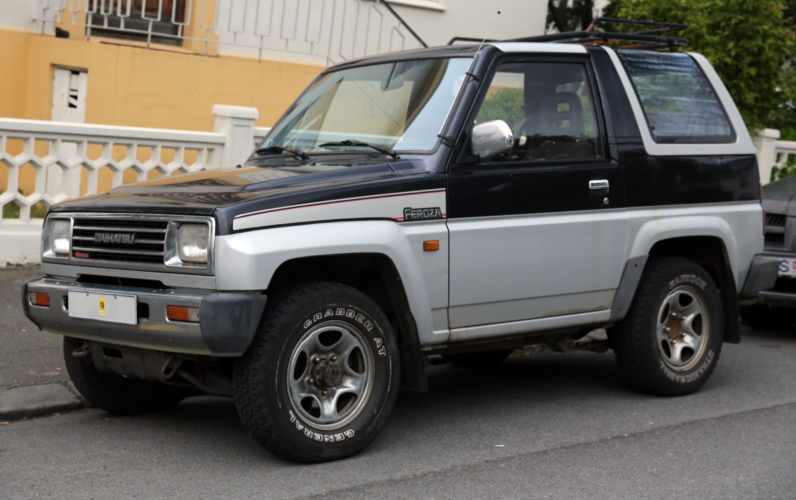 Compact off-road SUV with boxy design and rugged tires