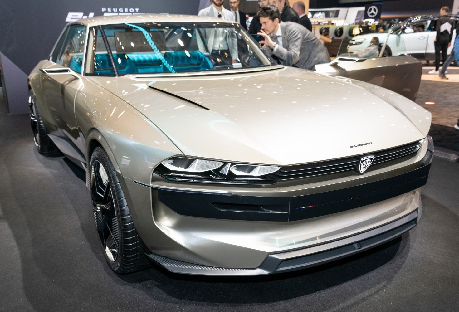 Sharp-edged headlights and futuristic front design with sculpted body lines