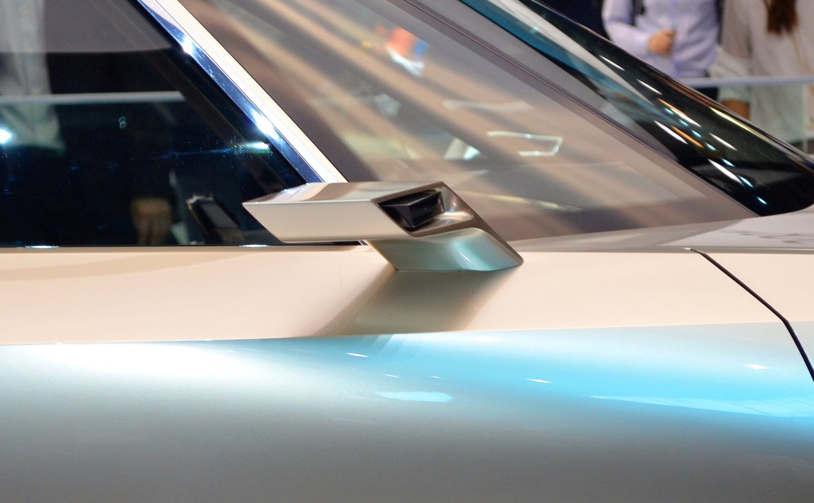 Aerodynamic side mirror with digital camera sensor on electric concept car